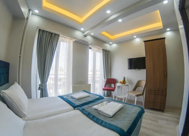 غرفة بسرير مزدوج بإطلالة على البحر بشرفة، Hotel Esen 3/6