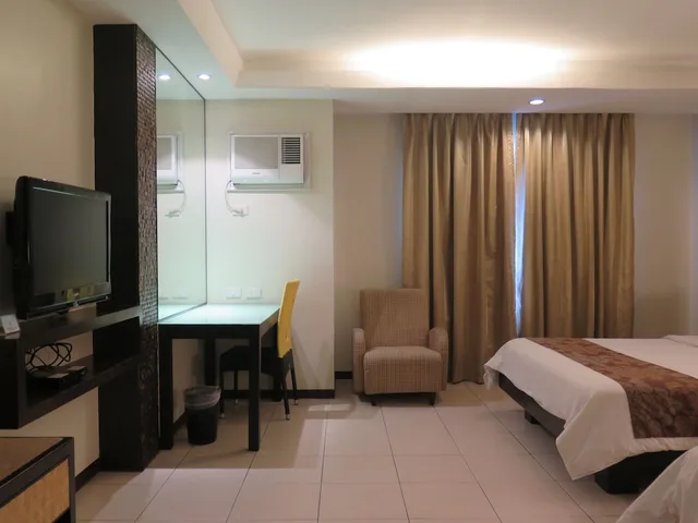 غرفة ديلوكس بثلاثة أسرّة، Circle Inn - Iloilo City Center 8/10