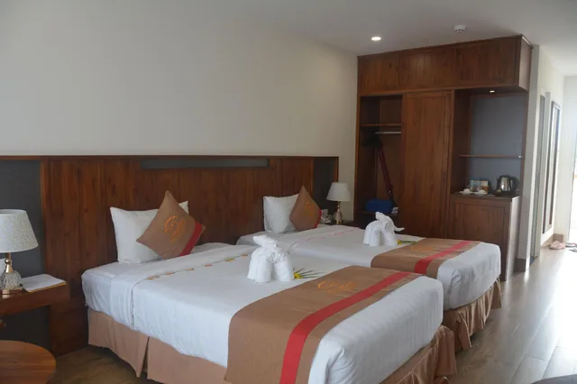 غرفة ديلوكس بسرير كوين وسريرين منفصلين، Le Aqua Resort & Spa Phan Thiet 1/1