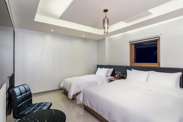 غرفة ديلوكس بسريرين منفصلين، Capace Hotel 3/5