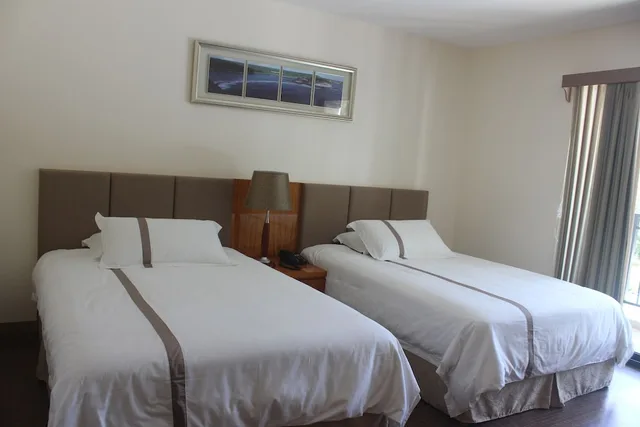 غرفة ديلوكس بسريرين مزدوجين بإطلالة على البحر، Saipan Beach Hotel 1/3