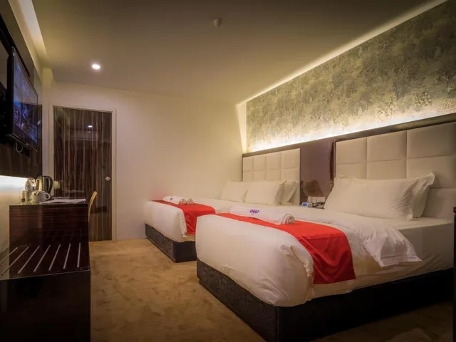 غرفة ديلوكس ثلاثية بسرير كوين وسرير فردي، Wiwo Hotel 3/3