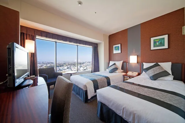 غرفة أساسية بسريرين منفصلين للمدخنين، Shin Yokohama Prince Hotel 1/6