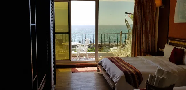 غرفة قياسية رباعية بسريرين مزدوجين بإطلالة على البحر، Ming-Jun Holiday Inn 7/10