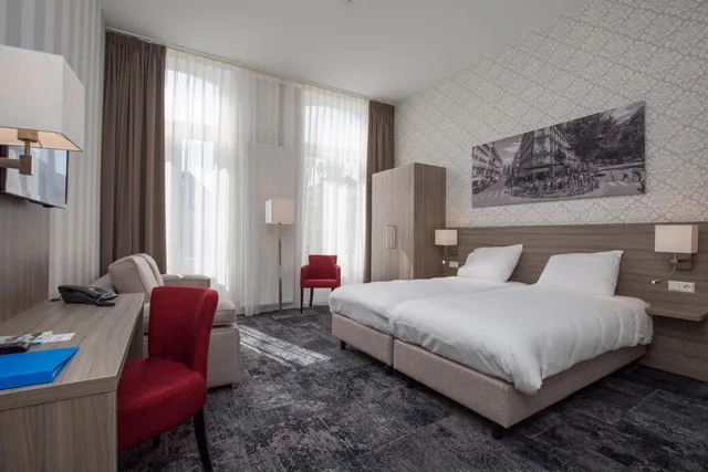 غرفة عائلية بسرير كينج مع أريكة، Fletcher Hotel-Restaurant Middelburg 1/1