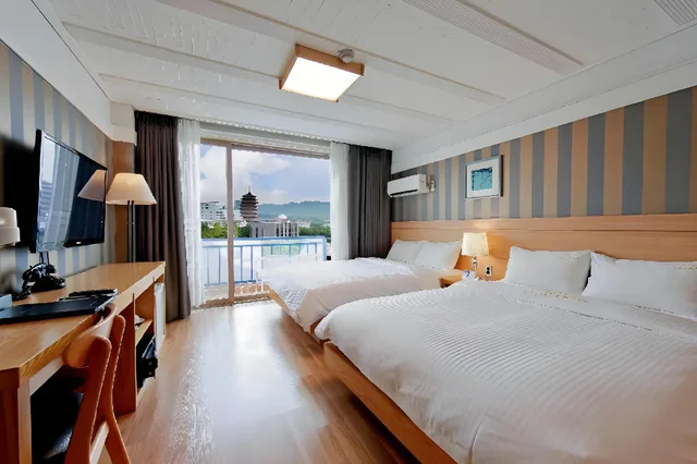 غرفة ديلوكس بسرير كوين وسرير فردي، Benikea Swiss Rosen Hotel 2/5