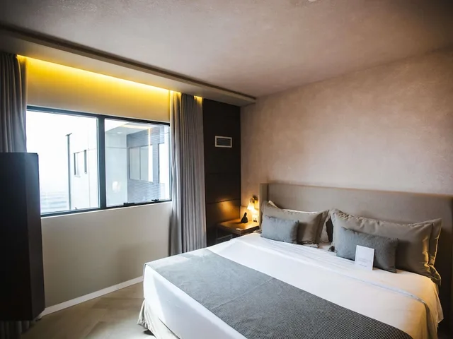 جناح جونيور بسرير كينج بإطلالة على البحر مع أريكة، Mercure Camboriu Hotel 1/1