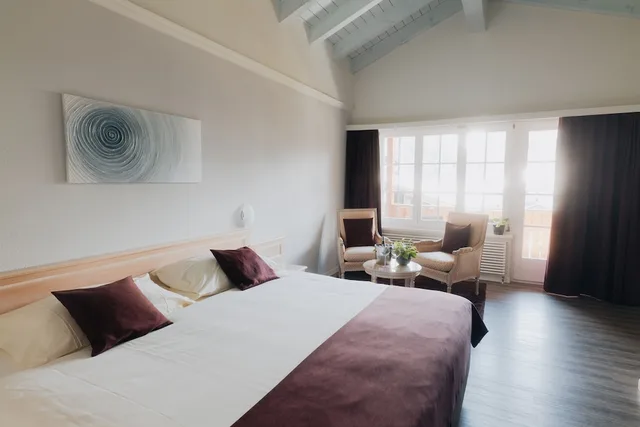 غرفة سوبيريور بسرير مزدوج بإطلالة على الجبل بشرفة، Hotel Schweizerhof Gourmet Spa 1/2