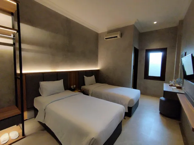 غرفة ديلوكس بسرير مزدوج أو سريرين منفصلين، The Grand Palace Hotel Malang 1/3