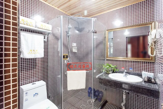 غرفة سيغنتشر بسرير كينج، Cheng Shi Ge Hotel 1/1