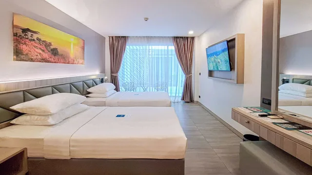 غرفة ديلوكس بسريرين منفصلين بشرفة، Clarian Hotel Beach Patong 5/10