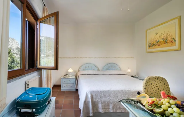 غرفة قياسية بسرير مزدوج أو سريرين منفصلين، Myo Hotel Rocce Sarde 4/4