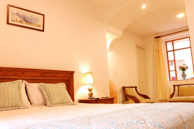 جناح ديلوكس بسرير كينج بغرفة نوم واحدة بحمام خاص في الطابق الأرضي، Casa Hotel Las Plazas 3/3
