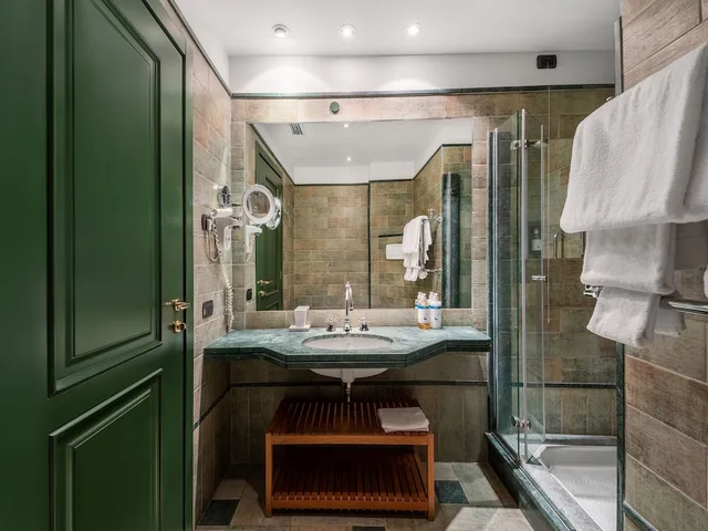استوديو كبير بسرير كوين مع أريكة بمطبخ صغير، Camperio House Suites 4/4