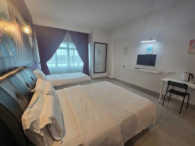 غرفة عائلية بسرير كوين وسرير فردي، Aster Hotel Bukit Jalil 1/3
