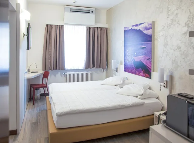 استوديو بسرير كوين وسريرين منفصلين بغرفتي نوم مع أريكة، Acquarello Swiss Quality Hotel 2/5