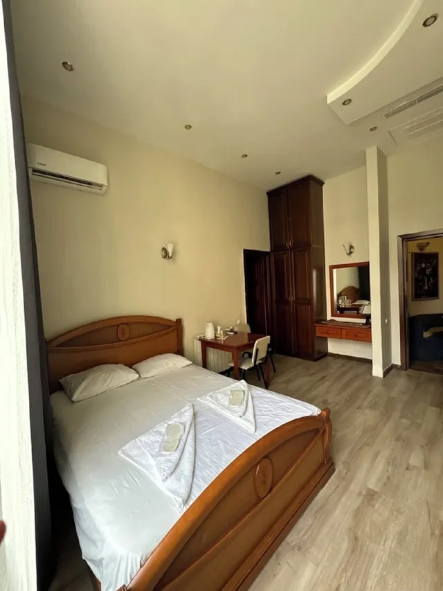 غرفة عائلية رباعية بسرير كوين وسريرين منفصلين، Bella Hotel 4/10