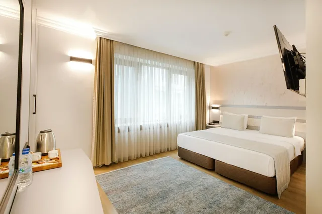 جناح متصل بسرير كينج مع أريكة، Marble Hotel Istanbul 2/10