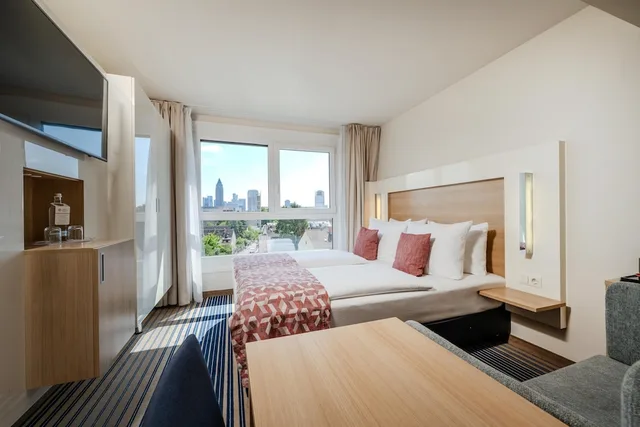 غرفة قياسية بسرير كوين بإطلالة على المدينة، Best Western Plus Welcome Hotel Frankfurt 1/10