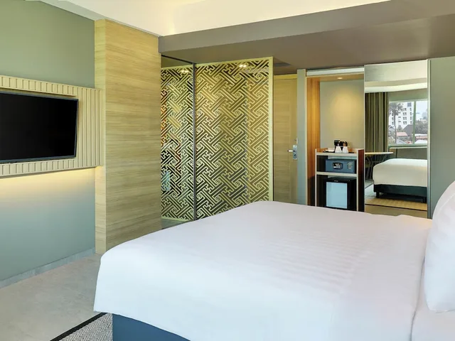 غرفة ديلوكس بسرير كينج مع أريكة، Mercure Makassar Nexa Pettarani 6/9