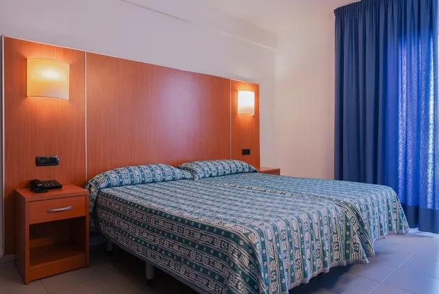 غرفة اقتصادية عائلية بسريرين منفصلين مع أريكة، Port Fiesta Park Hotel 3/7