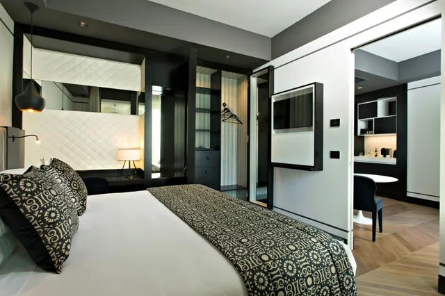 جناح عائلي بسرير كينج مع أريكة، Corso 281 Luxury Suites 1/2