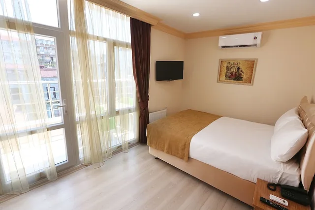 غرفة ديلوكس بسرير كوين بشرفة، Taksim Maxwell Hotel 2/10