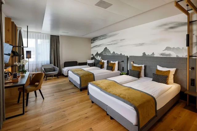 غرفة عائلية بأربعة أسرّة مع أريكة، Hotel Allegra Lodge 1/3