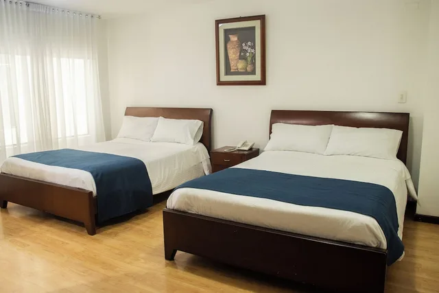 Room, 2 Queen Beds, Nogal Suite Hotel Pasto 2/8