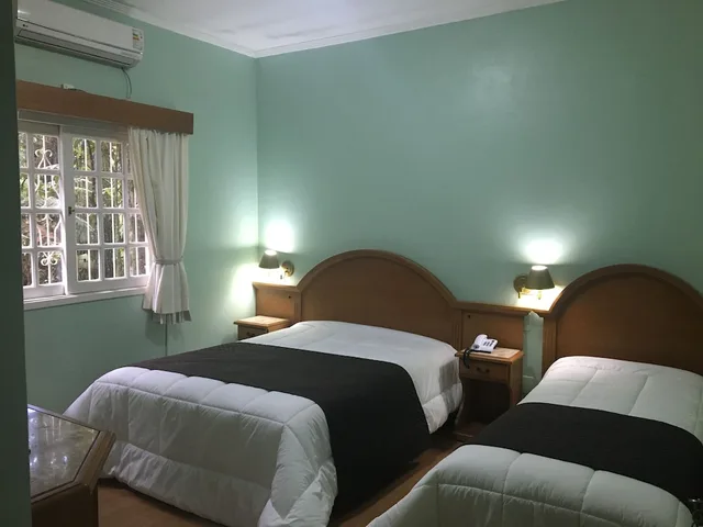 غرفة ديلوكس ثلاثية بسرير مزدوج وسرير فردي، Galo Vermelho Hotel 2/4