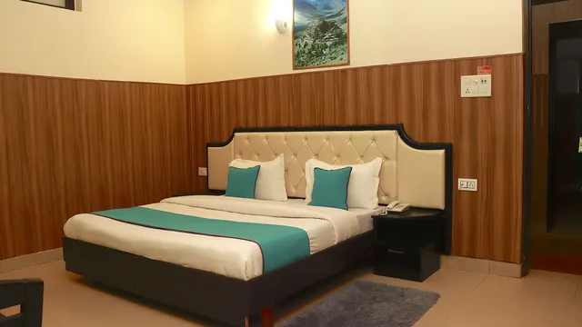 غرفة ديلوكس بسرير كينج بغرفة نوم واحدة، Oyo 1811 Hotel Leisure Palace 3/4