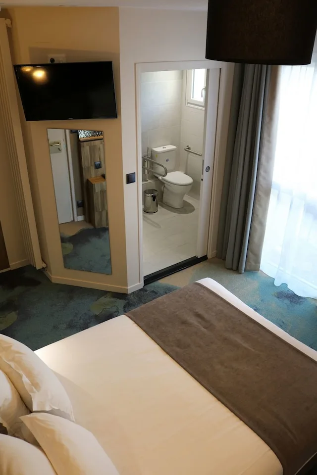 غرفة بسريرين منفصلين بإطلالة على الحديقة، Le Saint Aubert Hotel 3/6