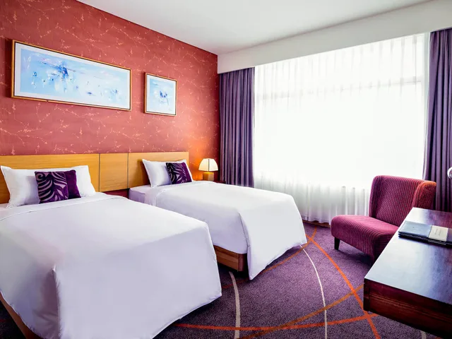 غرفة ديلوكس بريفيليج بسرير كوين بإطلالة على النهر مع دخول الصالة في طابق مرتفع، Grand Mercure Danang 1/6