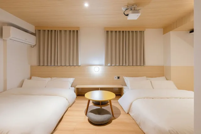 غرفة قياسية رباعية بسريرين مزدوجين، Myeongdong Guesthouse Como 3/6