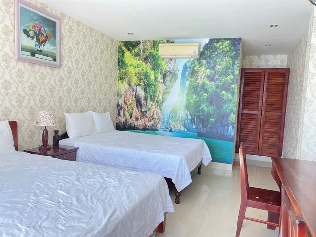 غرفة عائلية بسريرين مزدوجين بإطلالة على الحديقة، Hai Yen Resort 2/10