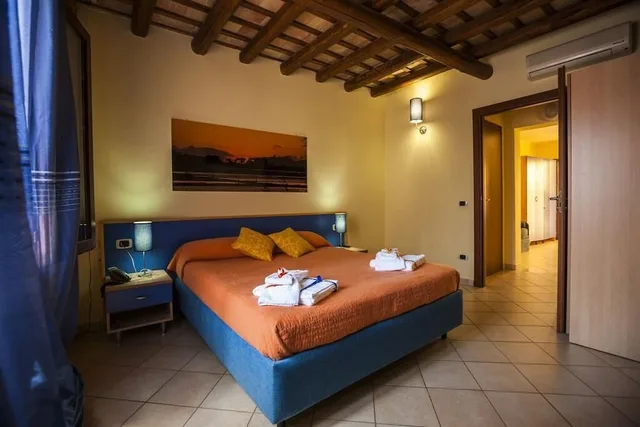 شقة عائلية بسريرين مزدوجين بغرفتي نوم مع أريكة، Residence Cortile Merce 2/8