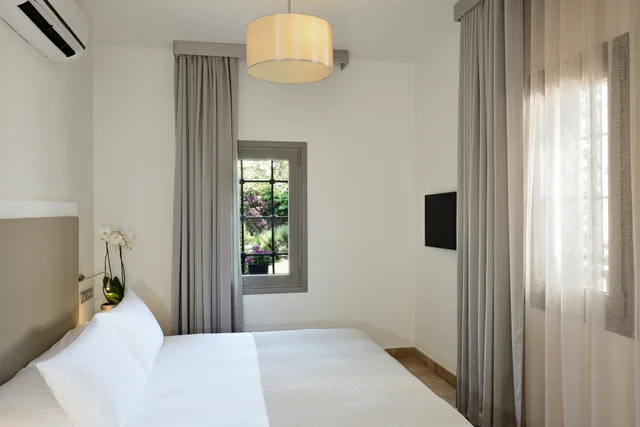 غرفة ديلوكس بسرير مزدوج بإطلالة على الحديقة، Yalikavak Marina Garden Hotel 1/4