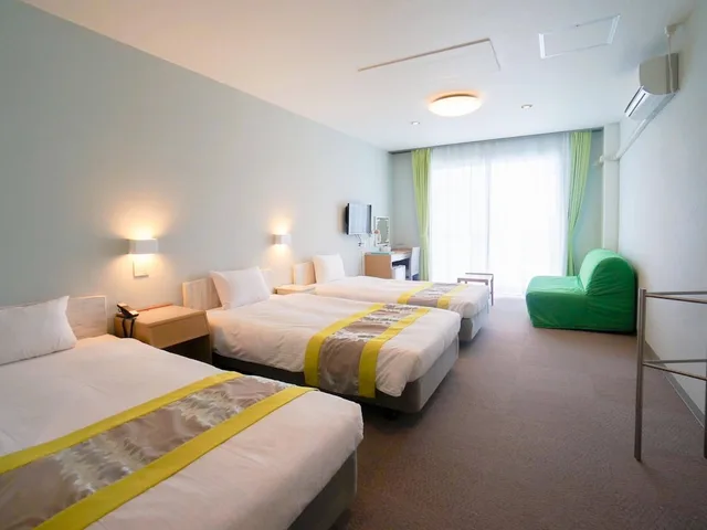 غرفة ثلاثية بثلاثة أسرّة، Hotel Caretta Amami 1/5