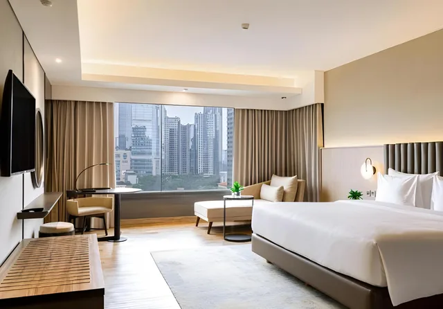 غرفة بريميوم عائلية بسرير كينج مع أريكة، ARTOTEL Suites Mangkuluhur 2/2