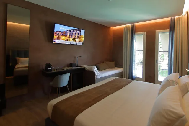 غرفة ثلاثية بشرفة، BellArrivo Hotel 1/10