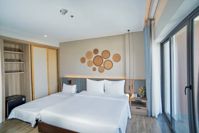 غرفة ديلوكس بسرير مزدوج أو سريرين منفصلين بإطلالة على البحر بشرفة، Sonaga Beach Resort & Villas Phu Quoc 3/10