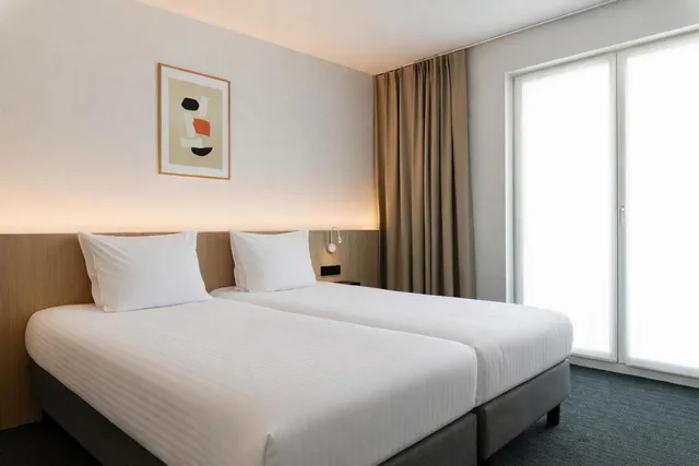 غرفة سوبيريور بسريرين منفصلين بإطلالة على المدينة، Hotel Le Bois de Bruges 1/9