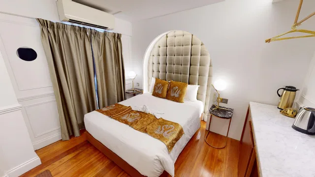 غرفة بريميوم بسرير كوين وسرير فردي، White Mansion Hotel 3/3