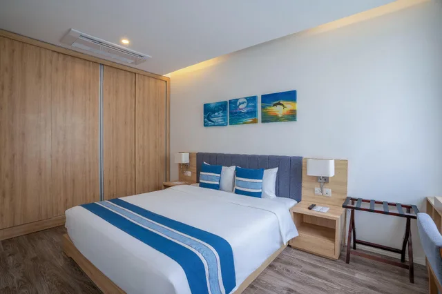 استوديو بسرير كينج بإطلالة جزئية على البحر مع أريكة، Parosand Danang Hotel 3/4