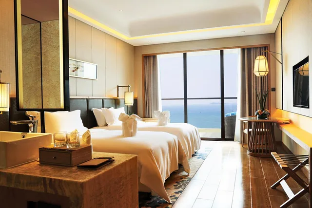 غرفة تنفيذية بسرير كينج بإطلالة على البحر، HARMAN HOTEL SANYA 5/6