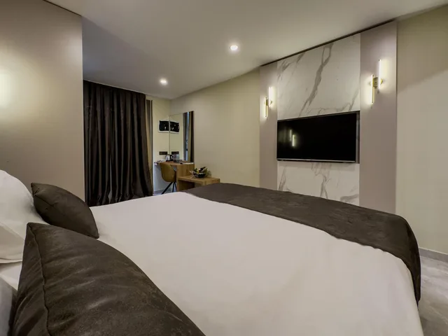 غرفة بسرير مزدوج بإطلالة على الحديقة، Quality Gold Suite Hotel 1/4
