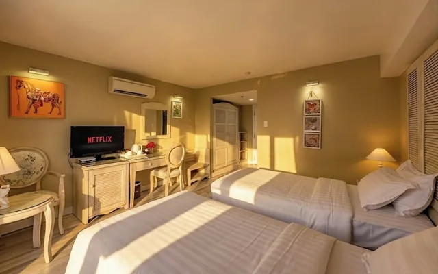 غرفة بزنس بسرير كينج بشرفة، Hotel L Odeon Phu My Hung 6/8