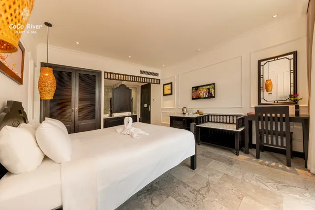 غرفة ديلوكس بسرير مزدوج بإطلالة على الحديقة، Hoi An Coco River Resort Spa 2/3