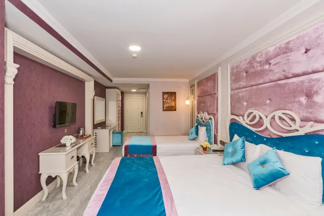 Multiple Bedrooms, Deluxe, Quadruple, 1 Queen and 1 Single Bed، Marnas Hotel 1/3