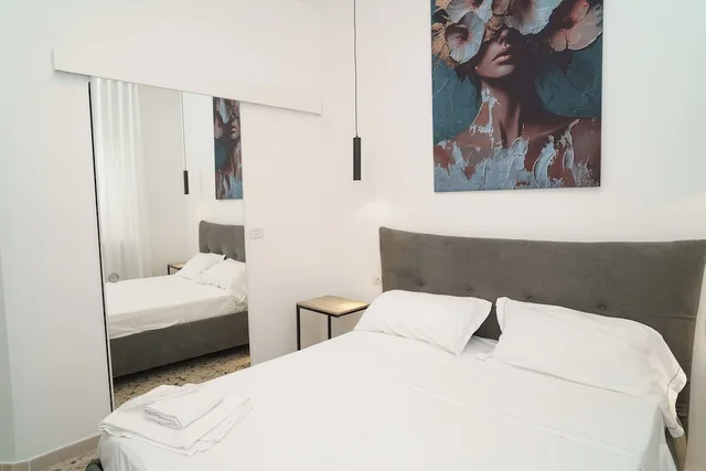 غرفة كومفورت ثلاثية بسرير كوين وسرير فردي في الطابق الأرضي، B&B Il Geranio 6/10